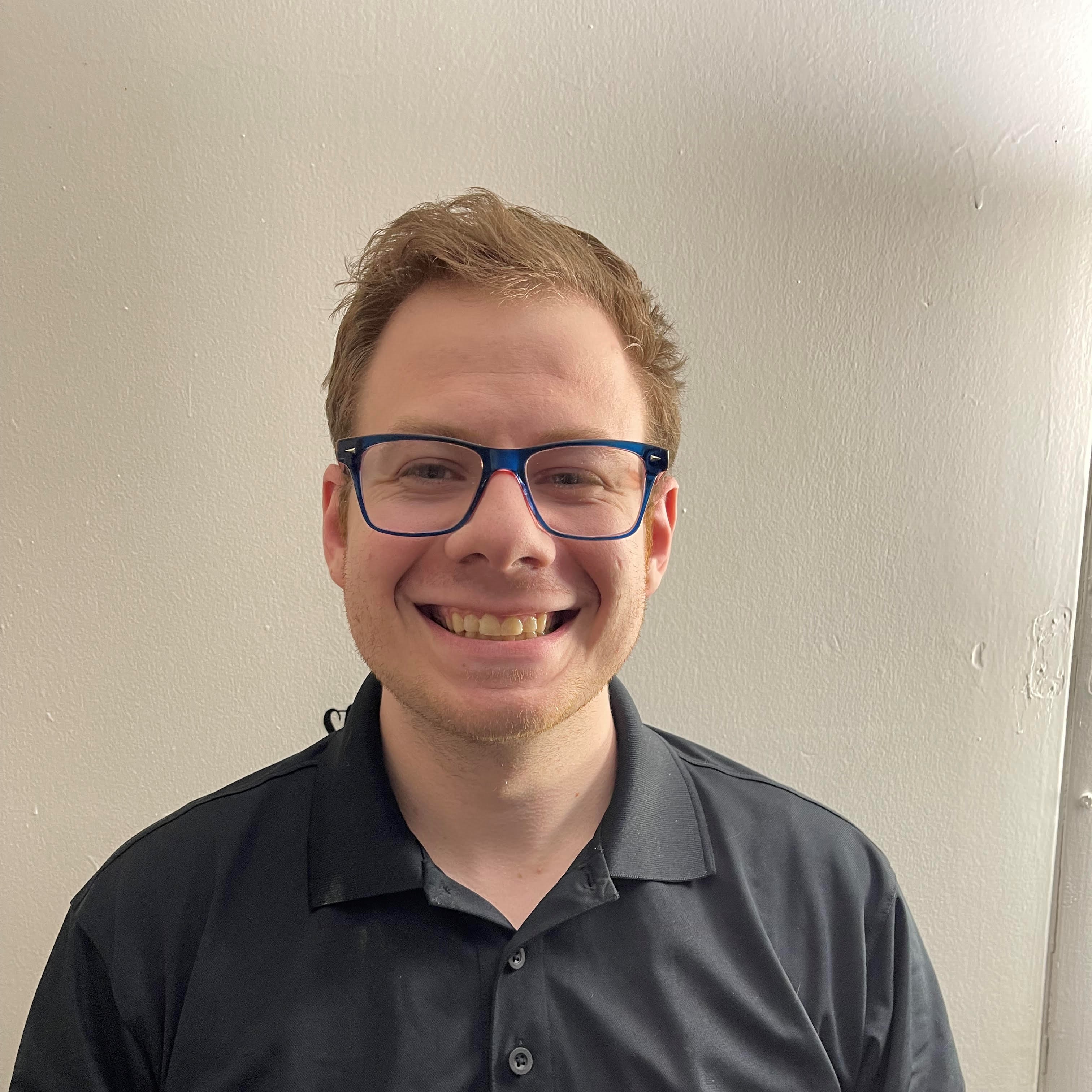 Image of mans face giving awesome smile